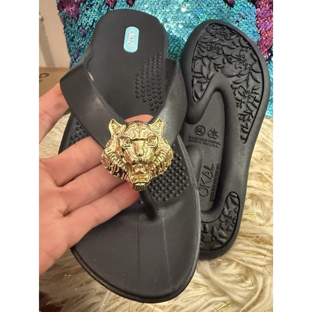 New Okab Black Licorice Gold Lion Head Rubber Flip Flop Thong Sandals Womens M/L